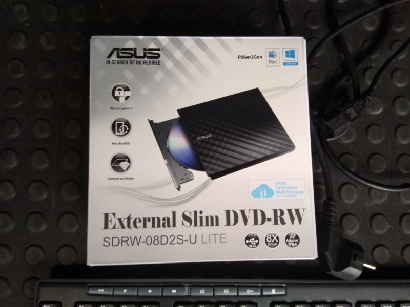 Myydään Asus SDRW-08D2S-U ulkoinen DVD asema sekä Logitech näppis+hiiri |  Konkurssihuutokauppa